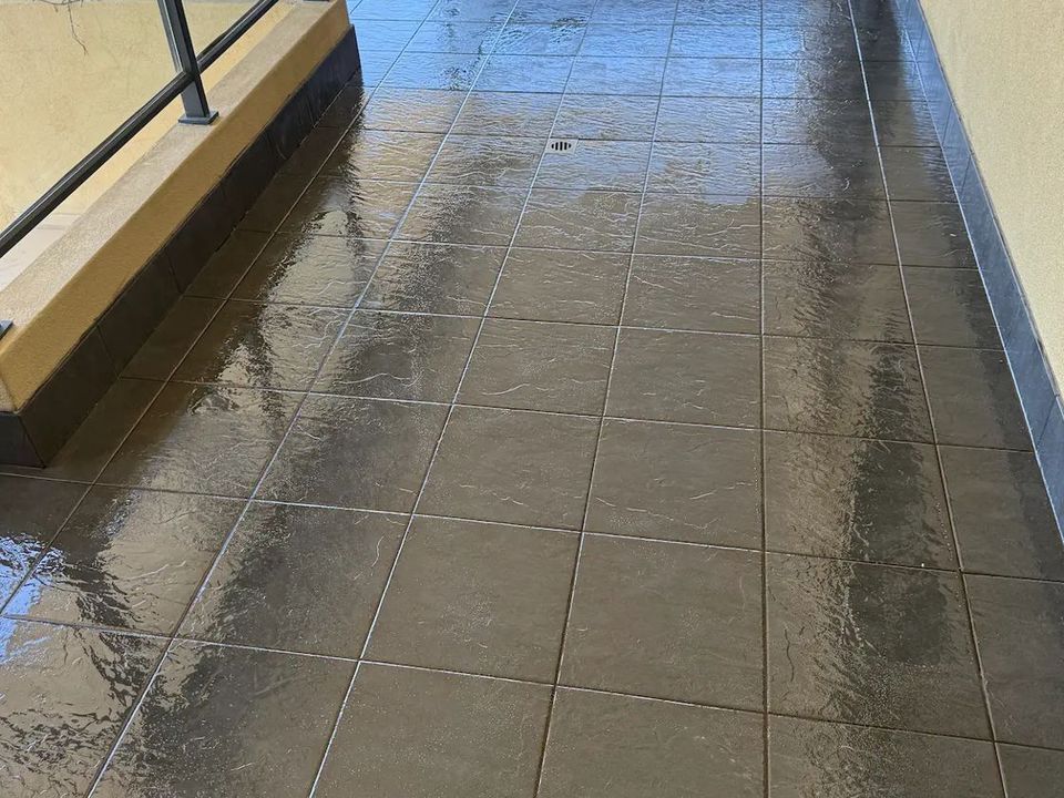 Glossy clear-sealed tiled balcony